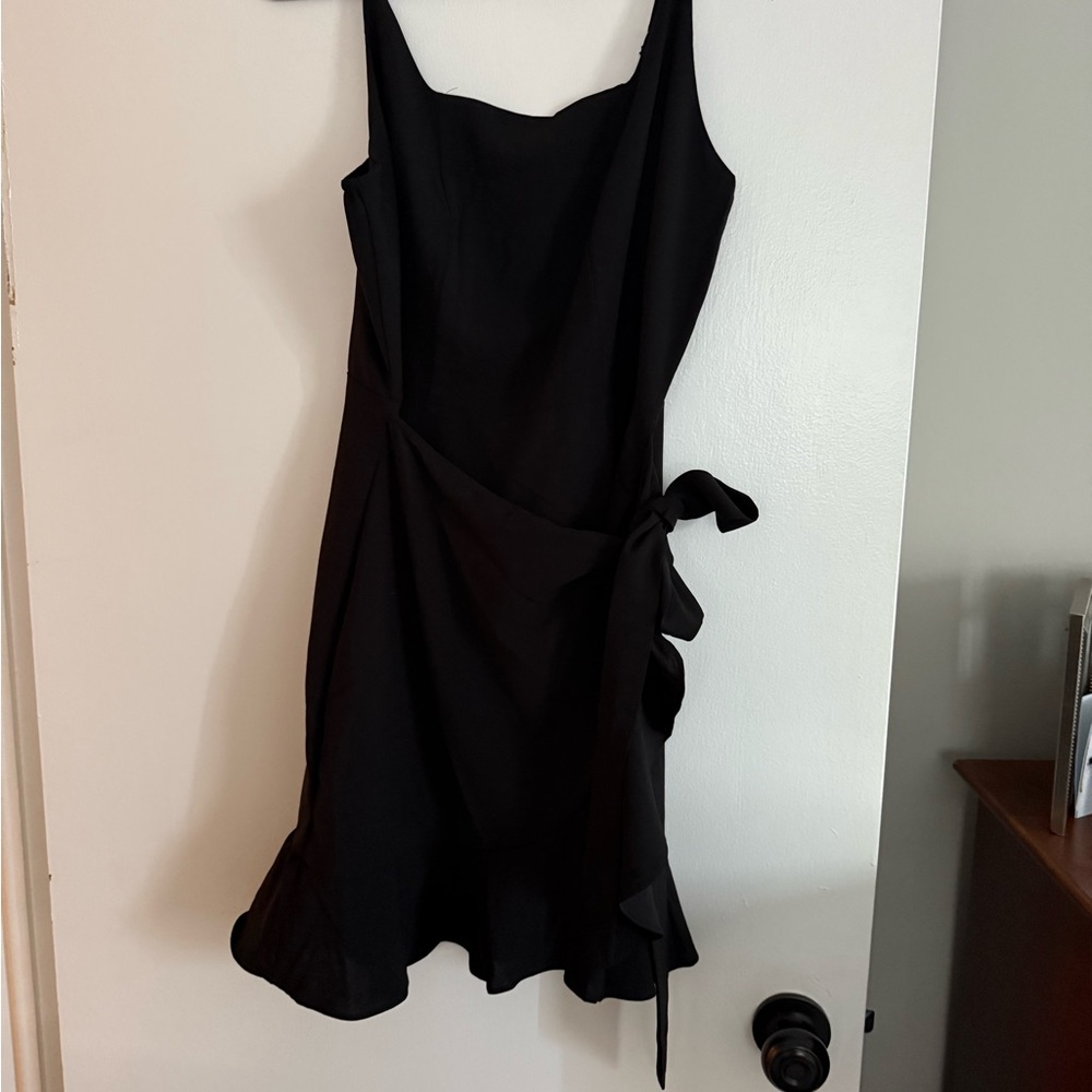 Black wrap Dress with ruffle detail at skirt